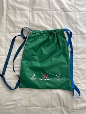 Green Drawstring Bag with Blue Straps